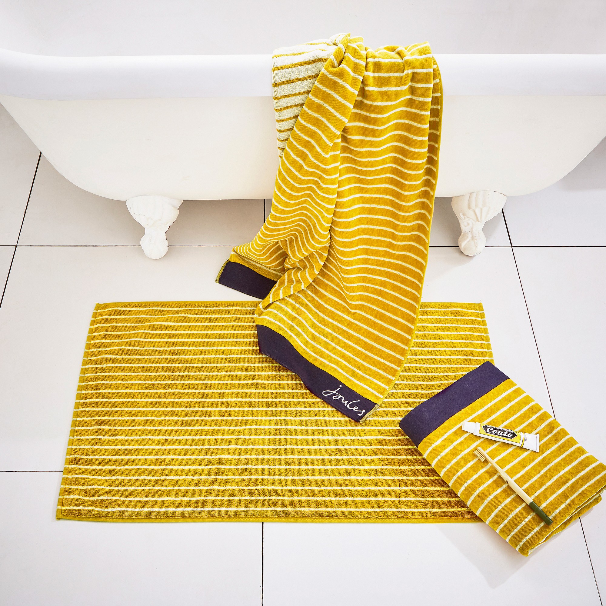 Harbour Stripe Bath Mat By Joules In Antique Gold Yellow